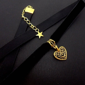 A ladies/girls black velvet & gold colour  10mm (half inch) choker heart necklace.
