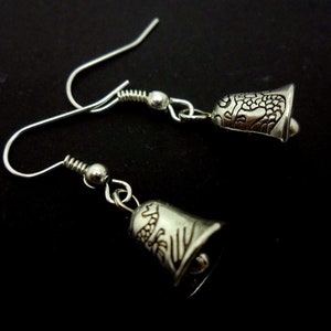 A pair of pretty tibetan silver bell  themed  dangly earrings.