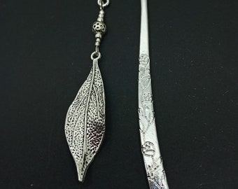 A hand made tibetan silver leaf themed bookmark. New. 12cm long.