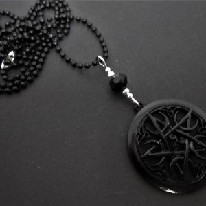 A lovely metal pentangle pentagram and black ball chain pendant necklace. 27&quot; chain.