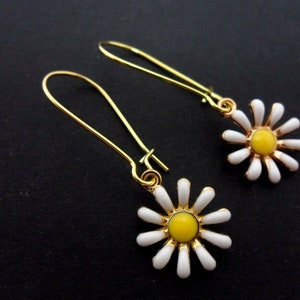 A pair of gold colour  daisy earrings on kidney wire hooks. New.