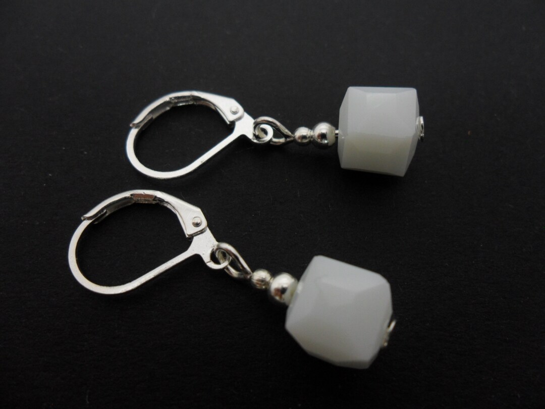 Puffed Hollow Heart 24x10mm Dangling Hook Earrings in .925 Puffed Hollow Heart 24x10mm Dangling Hook Earrings in .925