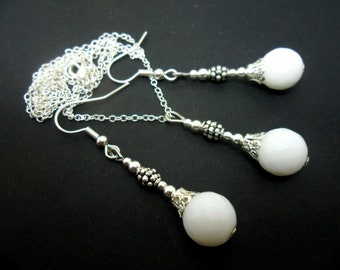 A hand made white jade faceted beads  necklace and  earring set.
