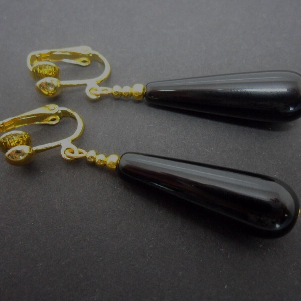 A pair of pretty black onyx bead long dangly teardrop clip on earrings.