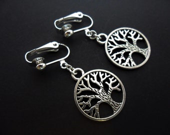 A pair of pretty tree of life dangly clip on earrings.