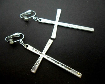 A pair of hand made tibetan silver big  cross  dangly clip on earrings.