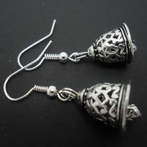 A pair of pretty tibetan silver bell  themed  dangly earrings.