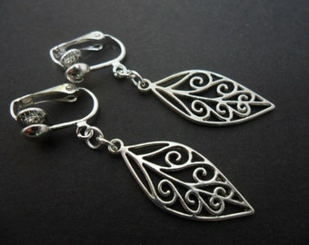 A pair of  hand made tibetan silver dangly leaf themed dangly clip on earrings. new.