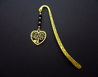 A pretty hand made gold colour tree of life heart charm bookmark. 9cm long.