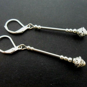 A pair of pretty tibetan silver  dangly leverback hook earrings.