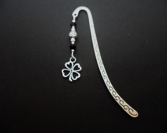 A tibetan silver four leaf clover and black crystal bead bookmark. 9cm long.