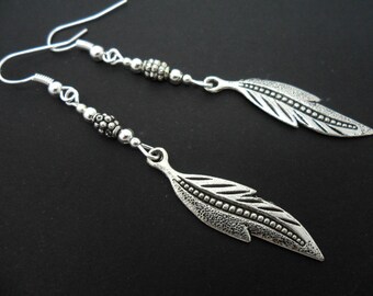 A Pair of Pretty Tibetan Silver and Turquoise Bead Feather