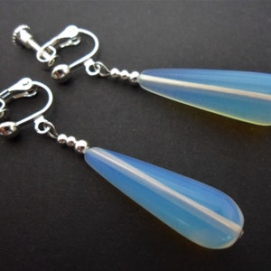 A pair of pretty opalite bead long dangly teardrop screw back clip on earrings.