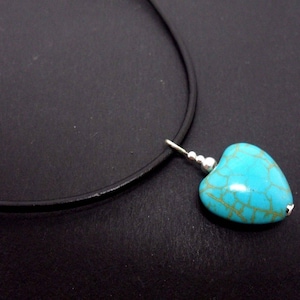 A leather cord 13" - 14" turquoise  heart charm choker necklace.