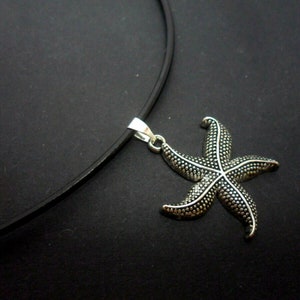 A leather cord 13&quot; - 14&quot; tibetan silver starfish themed charm choker necklace.