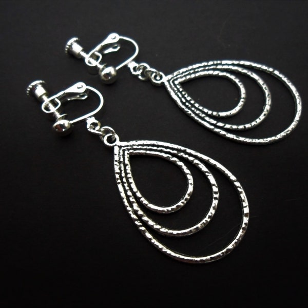 A pair of pretty hand made tibetan silver teardrop dangly screw back clip on earrings. new.