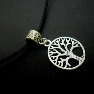 A leather cord 13" - 14" tibetan silver tree of life charm choker necklace.