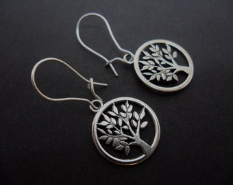 A pair of tibetan silver tree of life earrings on kidney wire hooks. New.
