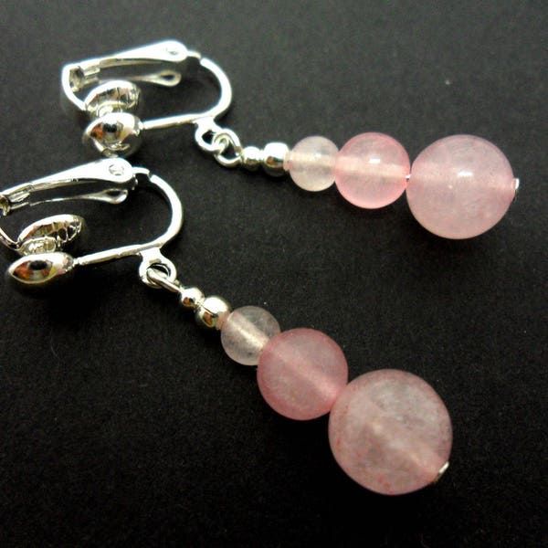 A pair of pretty pink  jade   dangly clip on earrings.
