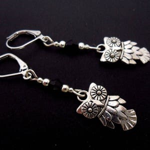 A pair of hand made tibetan silver dangly owl black crystal bead  leverback hook earrings. new.