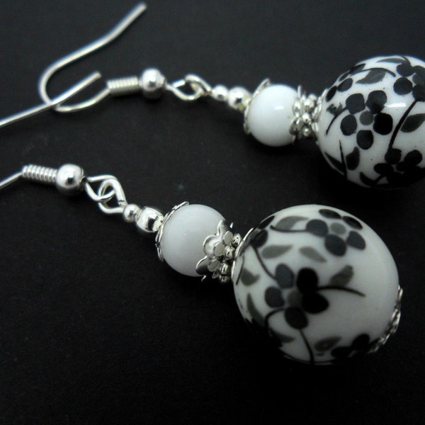 A pair of pretty porcelain flower  bead   dangly earrings.