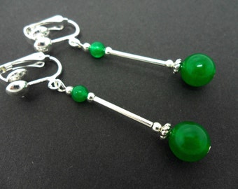 A pair of pretty green jade  bead  dangly clip on earrings.