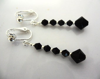 A pair of pretty black glass crystal  bead   dangly clip on  earrings.