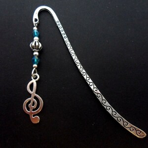 A tibetan silver and treble clef musical note charm  & blue crystal  bookmark. 9cm long.