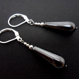 A pair of pretty hand made hematite teardrop   dangly leverback hook earrings. new.
