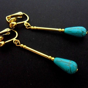 A pair of hand made gold plated  & turquoise bead dangly teardrop clip on earrings. new.
