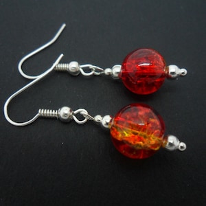 A pair of hand made dangly red & amber crackle glass  bead earrings. New.