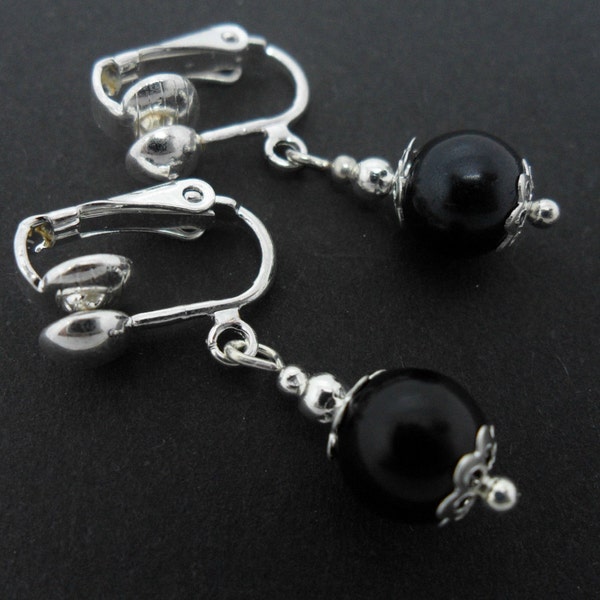 A pair of pretty black glass pearl  bead  dangly clip on earrings.