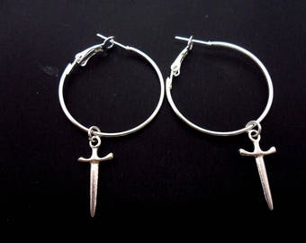 A pair of silver plated 30mm 1&quot; hoop and dagger/knife charm earrings.