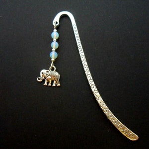 A tibetan silver elephant and opalite bead bookmark. 9cm long.