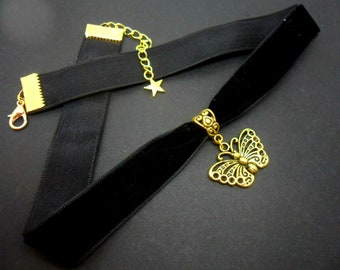 A ladies/girls black velvet & gold colour  16mm (1") choker butterfly necklace. new.