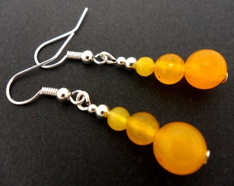 A pair of hand made pretty yellow  jade   dangly earrings.