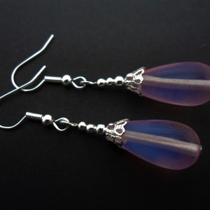A pair of pretty pale pink jade bead long dangly teardrop earrings.