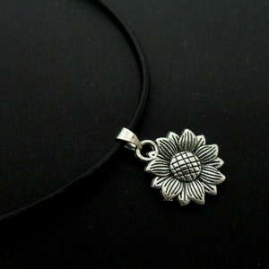 A leather cord 13" - 14" tibetan silver sunflower charm choker necklace.