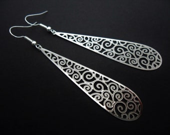 A pair of long dangly hand made silver colour filigree teardrop earrings. new.