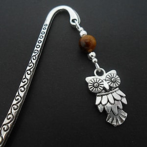 A tibetan silver owl and tigers eye bead bookmark. 9cm long.