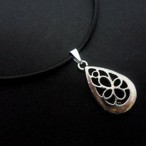 A leather cord 13" - 14" tibetan silver teardrop charm choker necklace.