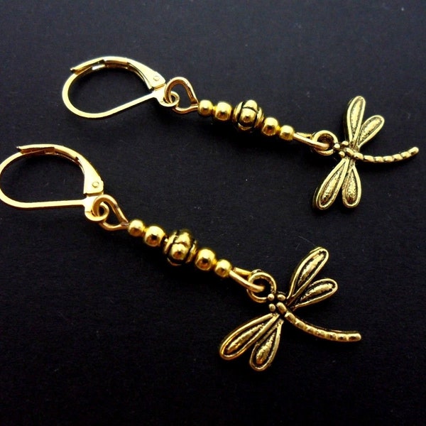 A pair of cute gold colour   dragonfly themed  dangly leverback hook earrings.