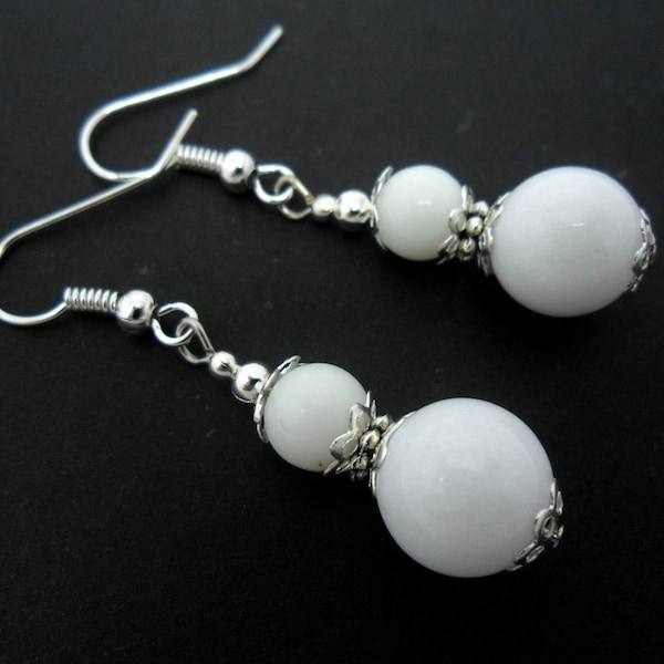 A pair of pretty white jade  bead  dangly earrings.