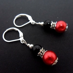 A pair of hand made red and black glass pearl bead leverback hook earrings. new.