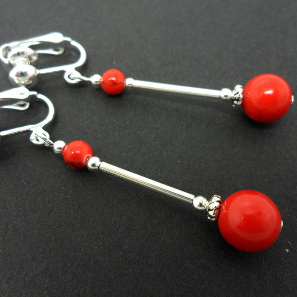 A pair of pretty red coral bead  dangly clip on  earrings.