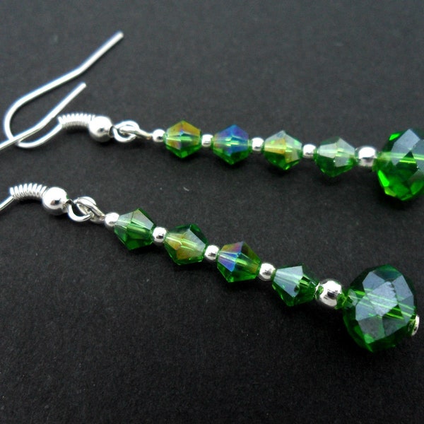 A pair of pretty silver plated green colour glass crystal bead  dangly earrings.