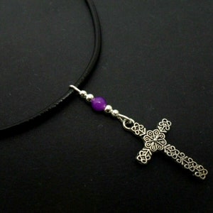 A leather cord 13" - 14" tibetan silver cross charm choker necklace.