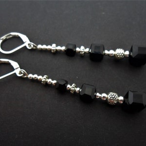 A pair of  hand made tibetan silver long dangly black crystal cube bead leverback hook earrings. new.