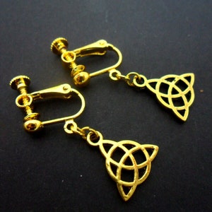 A pair of gold colour celtic knot dangly clip on earrings. new.