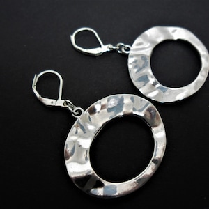 A pair of tibetan silver oval dangly leverback hook earrings. New.